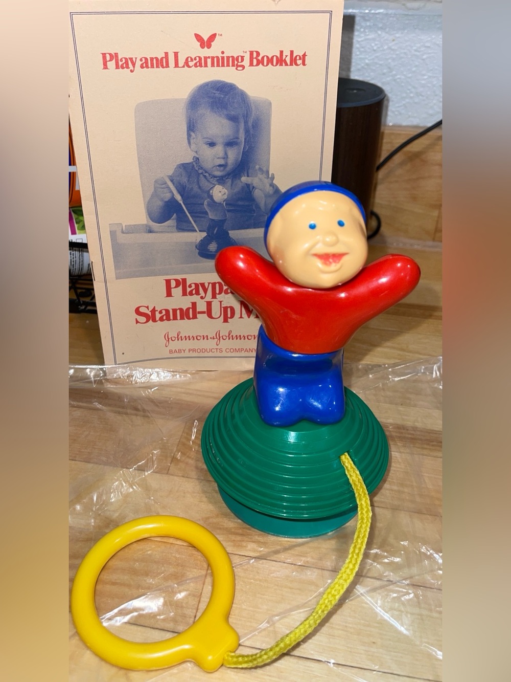 80’s Johnson & Johnson stand up man toy & booklet